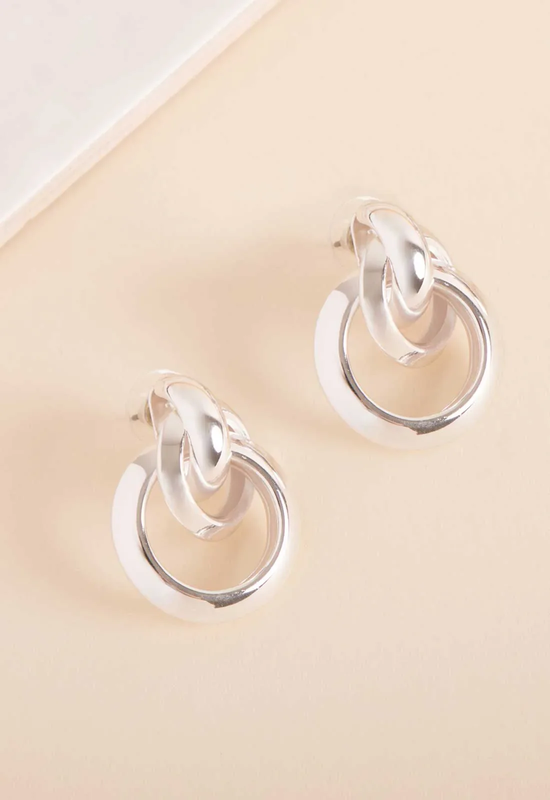 Always Chic Silver Knot Earrings - Image 4