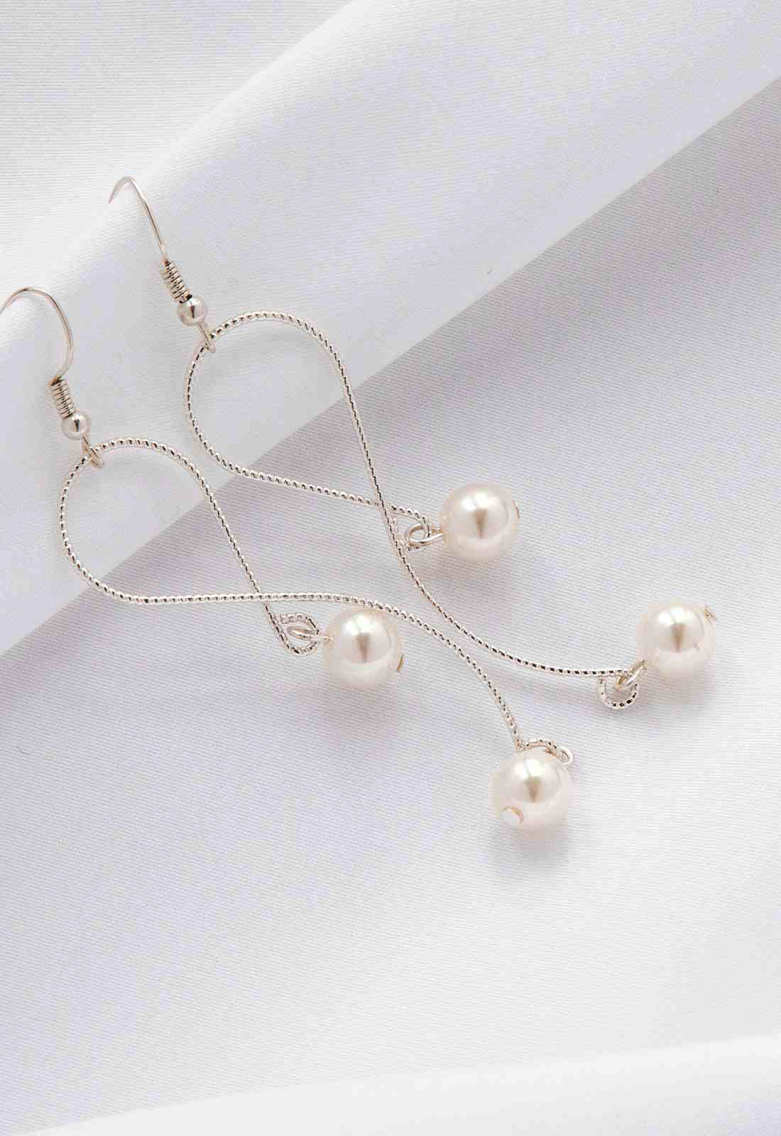 Always Chic Silver Pearl Snake Chain Earrings - Image 3